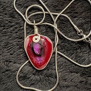 Handmade Red Glass Oval Pendant with Dichroic Glass inside
Wrapped in Silver 925